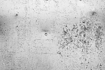 Texture of a metal wall with cracks and scratches which can be used as a background