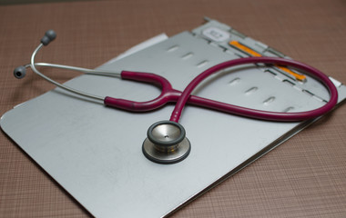 stethoscope on a metal file