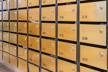 Letter mailbox array at entrance hall lobby of condominium building