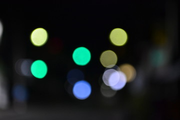 Bokeh at night at the red light intersection