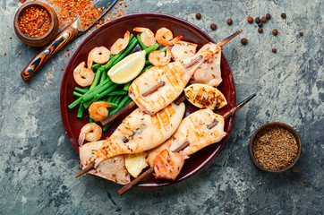 Grilled squid on a skewer