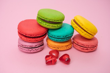 colorful almond cookies  on pink background