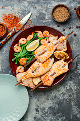 Grilled squid on a skewer
