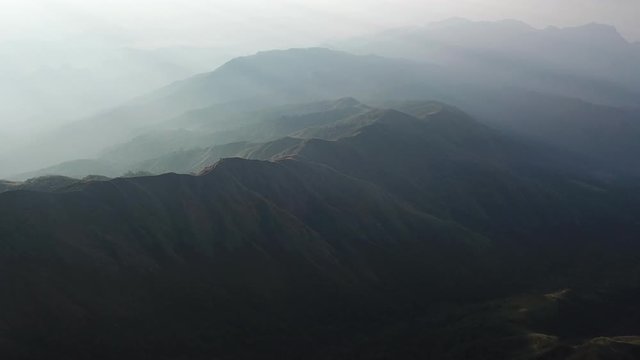 Mulayit Taung golden light of the morning sun and the mist covered on Mount Mulayit,Myanmar