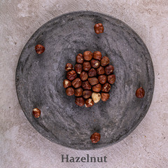 Hazelnut nuts on a round stand