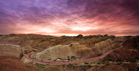 China landscape. Zhangye danxia geopark in the province of Gansu. Road through the rainbow mountains of China. 