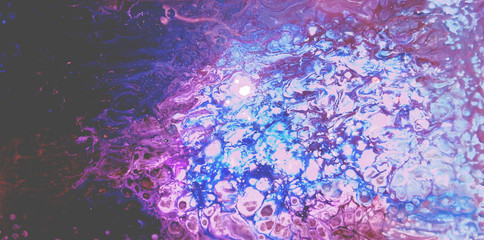 Abstract texture space watercolor background in purple blue and magenta colors.