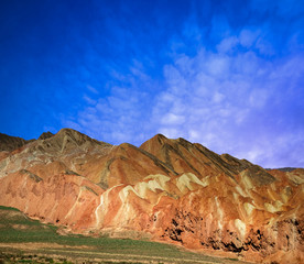 Fototapeta premium Zhangye Danxia geological layers sunset. rainbow mountains in Gansu Province. China landscape at Zhangye Danxia national geological park. 