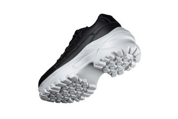 Black sneaker with white sole. Sport shoes.