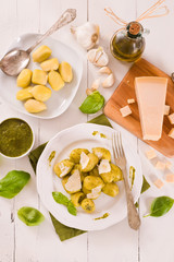 Potato gnocchi stuffed with pesto sauce.