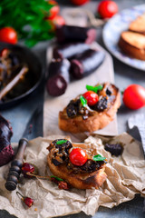 Black pudding with onion crostini.selective focus