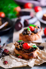 Black pudding with onion crostini.selective focus