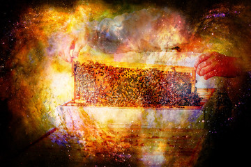 Beekeeper manipulating with honeycomb full of golden honey on abstract structured space background.