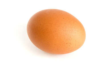 Homemade chicken egg on a white background with shadow