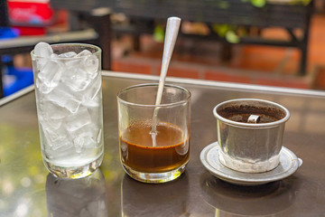 Traditional brewed Vietnamese coffee mixed with condensed milk