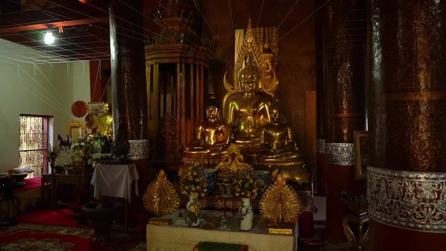 Worship Buddhist altar in a Chiang Mai Temple, Thailand.