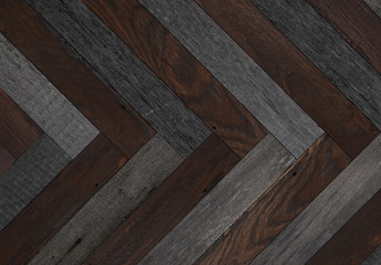 Old wooden wall with herringbone pattern.  Dark wooden boards texture for background.