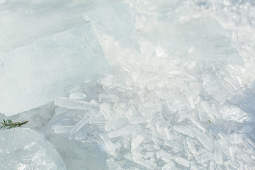 Amazing abstract broken ice crystals texture. Clear melting ice background.