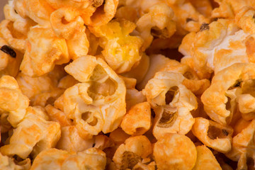 Popcorn in red and white cardboard box for cinema