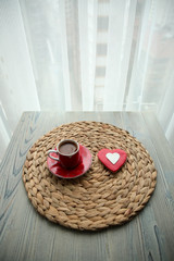 Fototapeta premium a cup of Turkish coffee and cookies specially prepared for Valentine's Day.