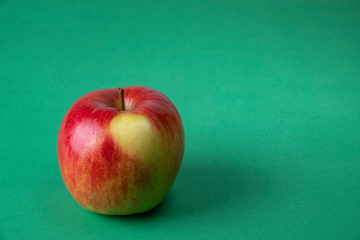 apple on green table