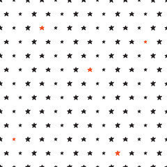 Fototapeta na wymiar Seamless pattern with black and orange stars for gift wrap, textile or book covers, wallpapers and scrapbook. Vector.
