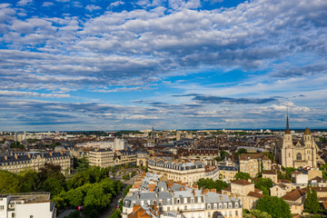 Fototapeta na wymiar Beautiful historical town Dijon, France under summer blue sky
