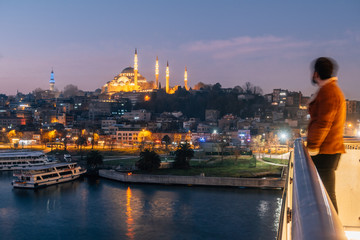 Fototapeta na wymiar Istanbul, Turkey - Jan 14, 2020: TSuleymaniye Mosque from Halic Metro Bridge