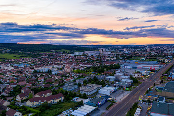 Aerial cityscape scenery of Dijon city in summer sunset evening