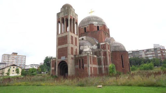 pan right unfinished Orthodox brick Christian church