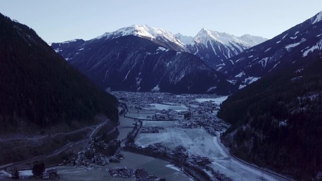 The peaceful valley town of Ziller by the stunning Zillertal mountain alps - aerial