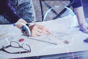 Financial trading chart double exposure with man desktop background.