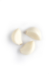 Obraz na płótnie Canvas close-up of young garlic isolated on white, natural vegetable garlic treat a variety of medical conditions, that is why it is used everywhere, in any dish