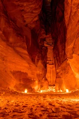 Fotobehang Siq canyon illuminated by candles, Petra, Jordan © salajean
