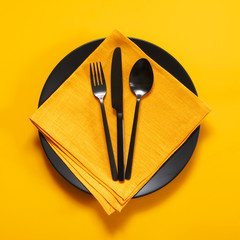 Yellow and black table setting