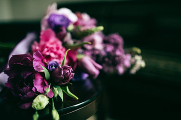 Purple rose. Beautiful purple wedding bouquet of lilacs, peonies, tulips