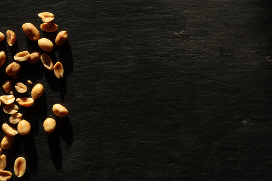 Photography of peanuts on slate for drinks and cocktail menu