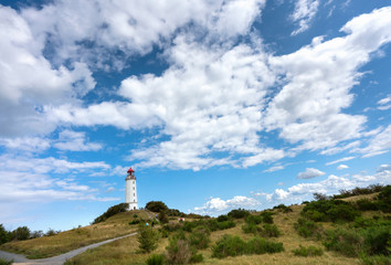 Fototapeta na wymiar Leuchtturm auf HiddenseeThe lighthouse on the island of Hiddensee near Rügen