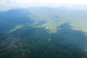 Fototapeta premium landscape, Sky and clouds beautiful The view out of an airplane in the morning thailand appropriate the background , idea copy space