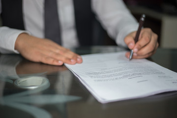 businessman signing contract