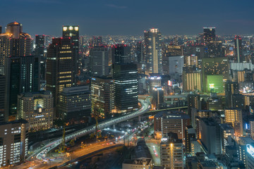 Fototapeta na wymiar Aerial view of traffic on highway road in Osaka, Japan