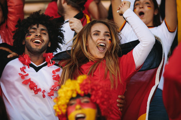 Fototapeta premium German spectators in stadium cheering their national team