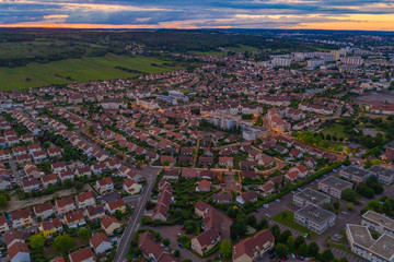 High angle aerial townscape view of Dijon city at sunset