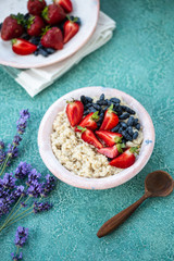 Healthy berry oatmeal breakfast bowl