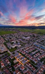 Panorama aerial townscape of Dijon city under orange sunset sky
