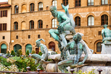Fototapeta na wymiar Fountain of Neptune by Bartolomeo Ammannati is a fountain in Florence, Italy, situated on the Piazza della Signoria in front of the Palazzo Vecchio, Florence, Italy, Europe