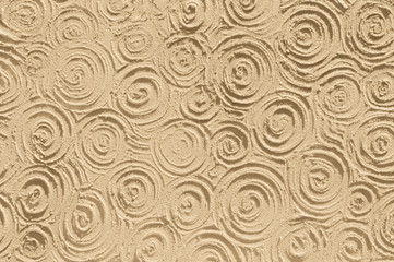 Abstract pattern on the summer beach sand. Top view.