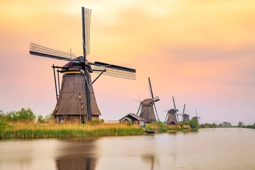 Fotobehang Windmills in Kinderdijk at sunset, The Netherlands © adamzoltan