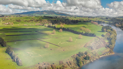 Aerial view of amazing hills and river with a beautiful sky