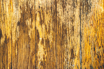 Rough wooden texture background. Orange brown surface with scuffs and scratches. Vertical lines